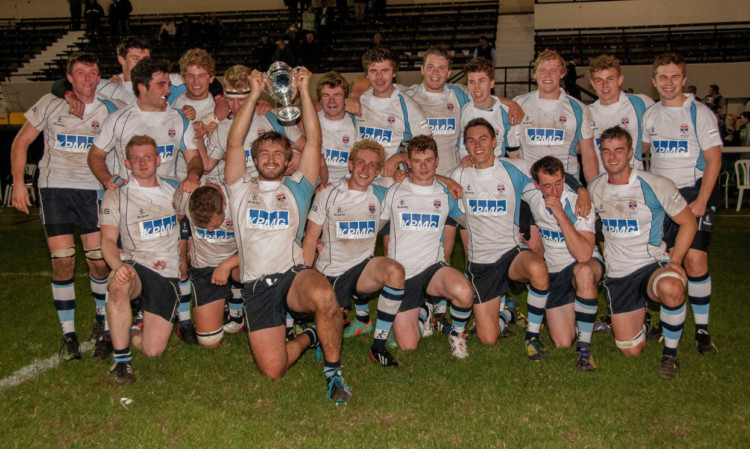 The winning St Andrews University squad celebrate with the trophy after their 24-15 triumph against Edinburgh in Richmond at the weekend.