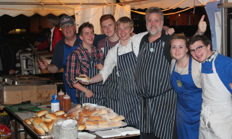 Clive Murray of Rotary Club of Dundee, Robson St Clair of Menzieshill High, Jamie Dunn of Dundee College, Shaun Falconer of Menzieshill High, Tim Baker of the Rotary Club of Dundee, Stephanie Baker of Dundee High, and Ewan Gray of St Johns High.