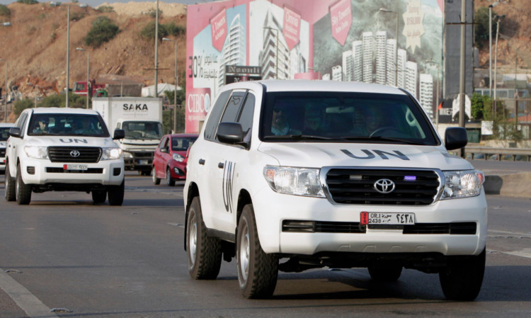 The convoy of UN weapons inspectors at Rafik Hariri international airport in Beirut, Lebanon.