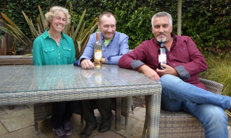 Judith and Ron Gillies of Cairn o Mohr winery relax with Paul Hollywood between takes.