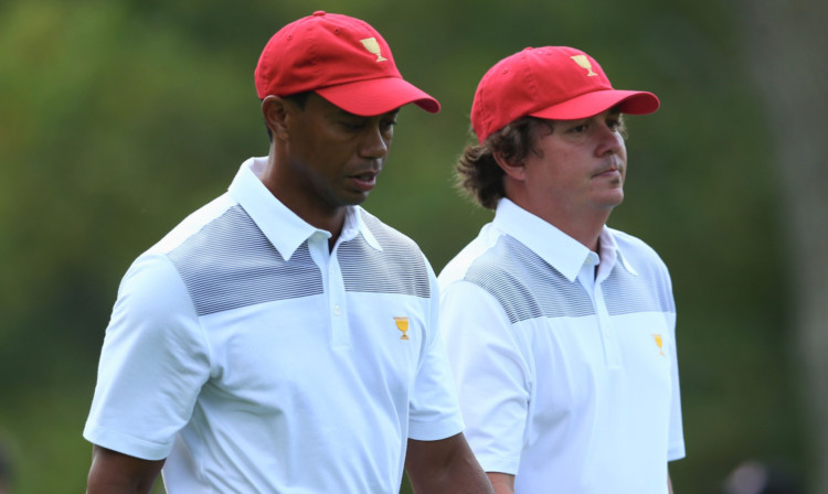 Jason Dufner and Tiger Woods at practice.