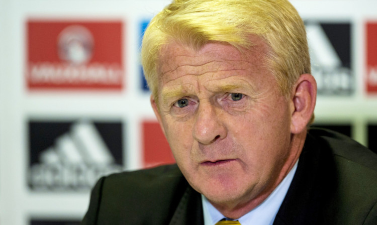 Scotland manager Gordon Strachan says he won't speak to Scott Brown about his red card against Barcelona.