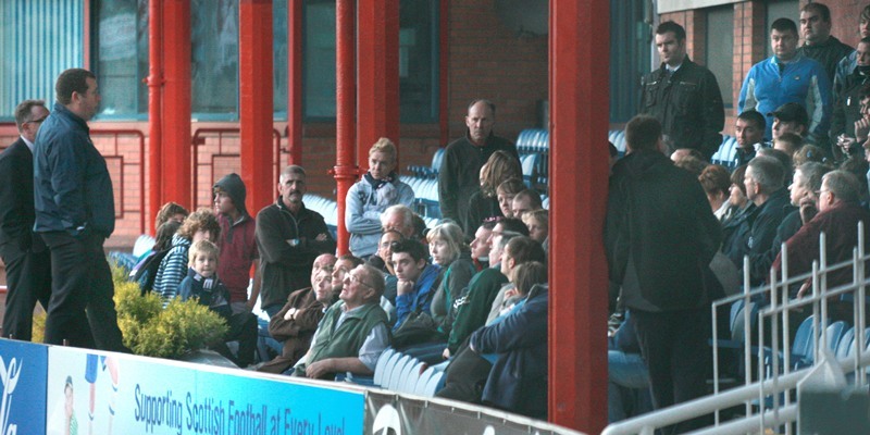 Kris Miller, Courier, 06/10/10, News. Picture today at Dens Park, Dundee. A demonstration was arranged outside the staium tonight but turned into a meeting with fans being invited into the stadium for talks. Pic shows Harry Maclean and Jim Thomson addressing worried fans in the main stand.