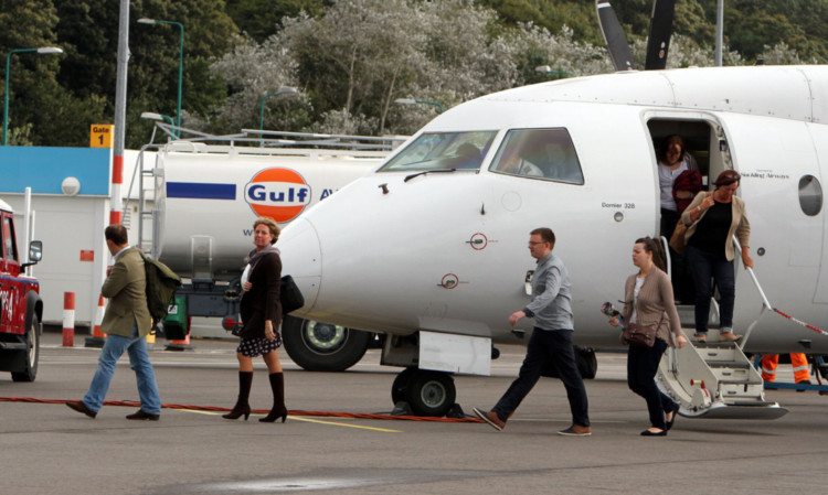 Passengers arriving in Dundee from London.