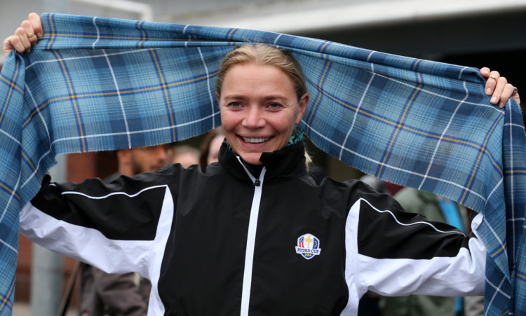 Jodie Kidd shows of the Ryder Cup tartan as the Ryder Cup captains visit  Auchterarder Primary School.