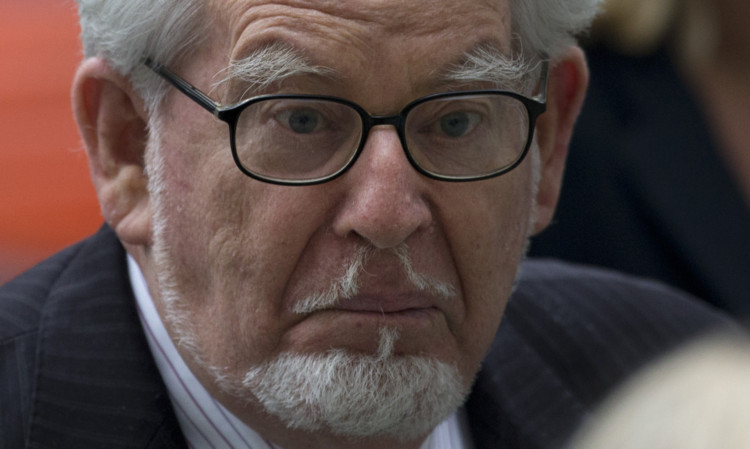 Rolf Harris will stand trial in April.