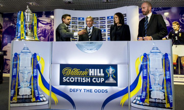 Nacho Novo (left) joins SFA President Campbell Ogilvie for the draw.