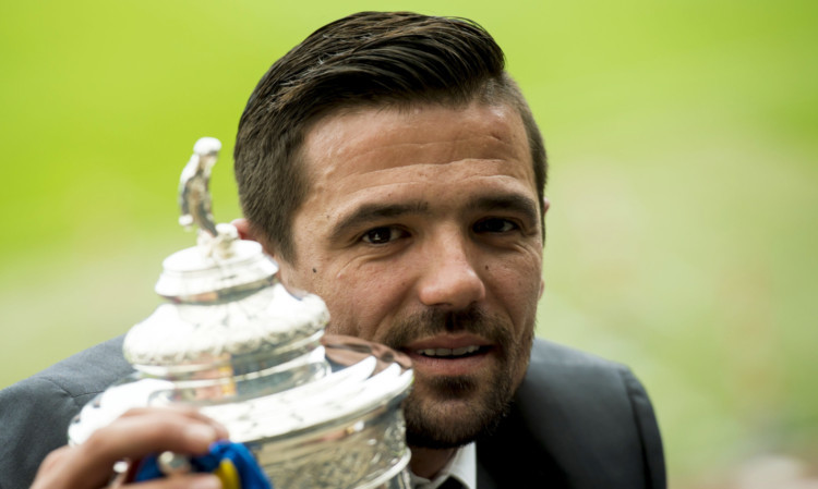 Nacho Novo with the William Hill Scottish Cup after making the draw at Hampden.