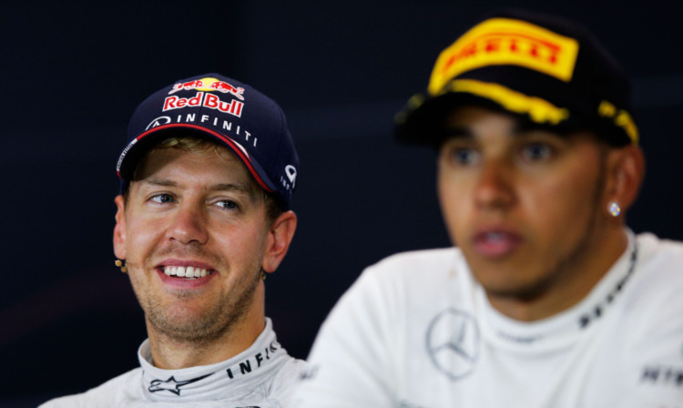 The dominance of Sebastian Vettel, left, could be turning people off F1, says Lewis Hamilton, right.