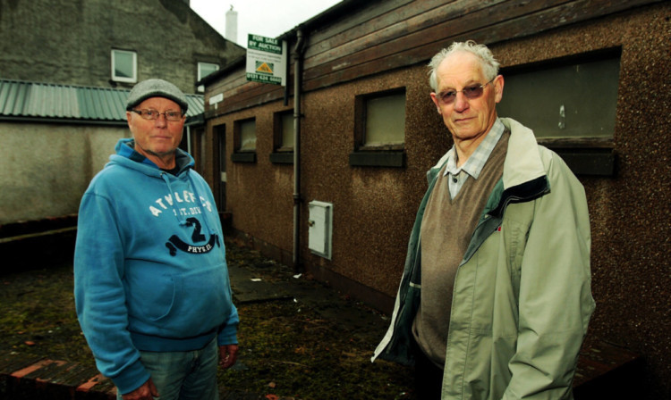 William Duncan and David Taylor outside the derelict toilet block in Cardenden.