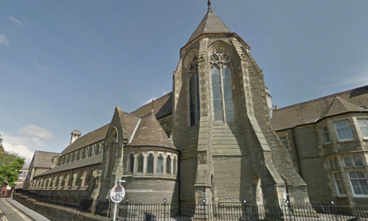 The handbag was stolen as the woman attended mass at St Mary's Church in Lochee.