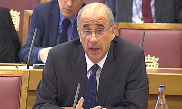 Sir Brian giving evidence.