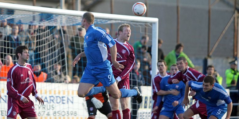 Kim Cessford, Courier - 23.10.10 - Montrose FC v Arbroath FC at Links Park, Montrose - Paul Tosh heads a corner kick on for Aaron Sinclair to score the opening goal