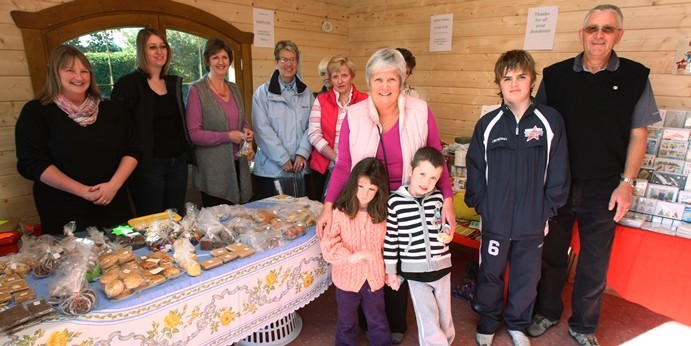 DOUGIE NICOLSON, COURIER, 24/10/10, NEWS.
DATE - Sunday 24th October 2010.
LOCATION - Highfield Place, Birkhill.
EVENT - Charity sale in aid of Yorkhill Childrens Hospital.
INFO - Some of those who attended the sale, organised by Colin Cocker, right, with special guests Ben and Lucy Parish, front.
STORY BY - Reporters.