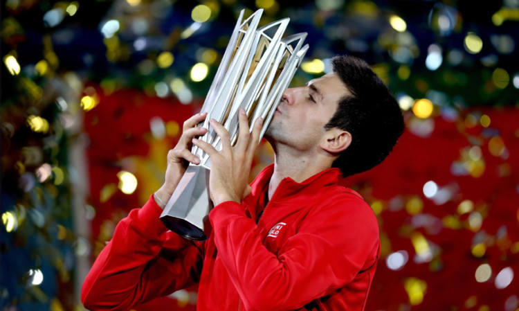 SHANGHAI, CHINA - OCTOBER 13:  Novak Djokovic of Serbia poses for photographers with the winner's trophy after defeating Juan Martin Del Potro of Argentina during the final of the Shanghai Rolex Masters at the Qi Zhong Tennis Center on October 13, 2013 in Shanghai, China.  (Photo by Matthew Stockman/Getty Images) ***BESTPIX***