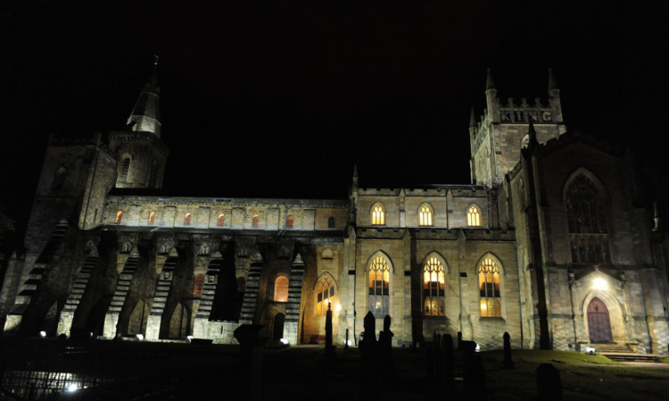 Left and above: Dunfermline Abbey is lit up.