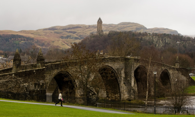 The National Wallace Monument, with Old Stirling Bridge in the foreground.