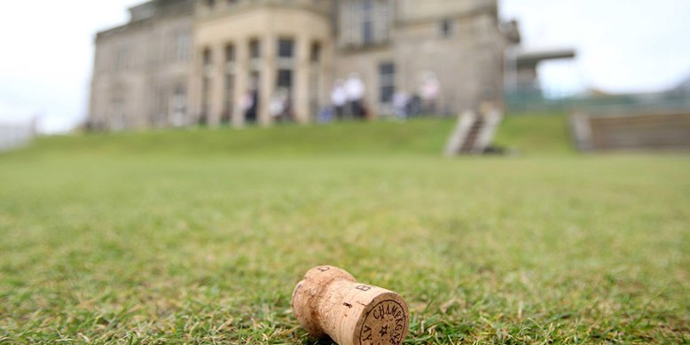 The Old Course, St Andrews. A Champagne cork lies on the grass outside the R&A building beside the 1st tee/18th green the day after The Open.