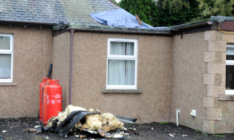 The remains of a fire at house in Inchture caused by electric cable theft.