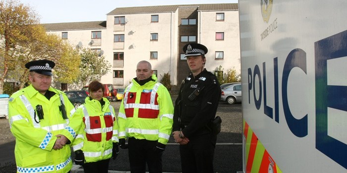 DOUGIE NICOLSON, COURIER, 28/10/10, NEWS.
DATE - Thursday 28th October 2010.
LOCATION - Viewmount, Forfar.
EVENT - Police Community Task Force.
INFO - L/R, Const. Ally Smith - Local Liason Officer, Community Wardens Gill Kay, Andy Brunton and Insp. Peter McLennan.
STORY BY - Graham, Forfar office.