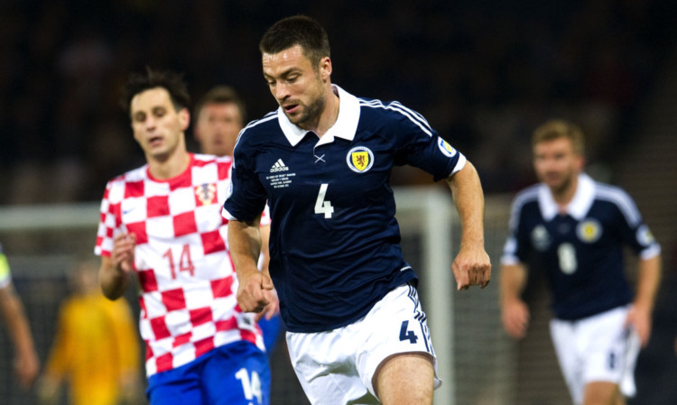 Russell Martin in action for Scotland.
