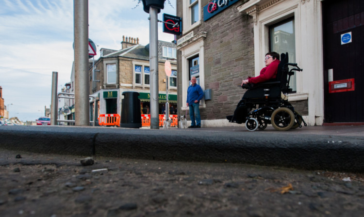 The man is accused of knocking over the grandmother outside the Clydesdale Bank on Brook Street.