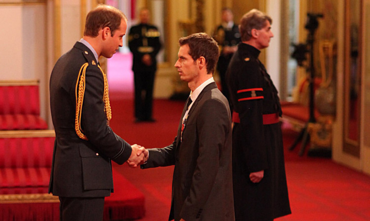 Andy Murray receiving his honour from Prince William at Buckingham Palace.