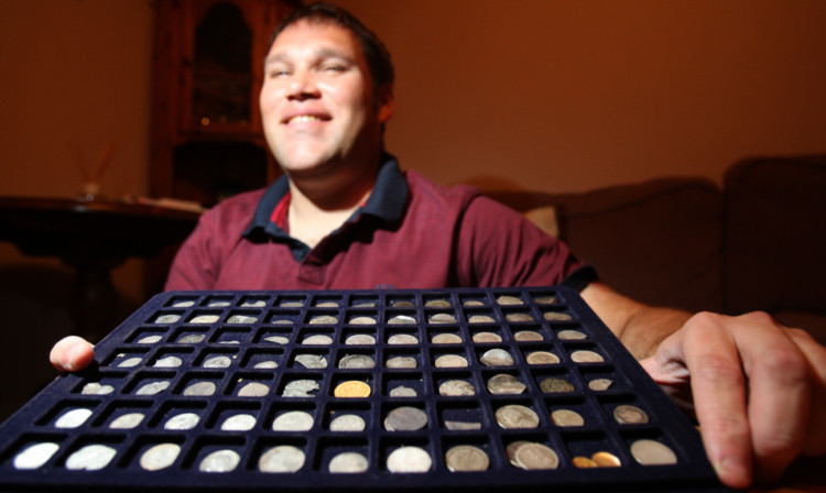 Jim Ingram with a collection of some of his other finds.