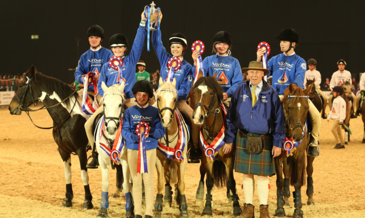 Strathearn storm to victory: from left Hamish dAth and Ultima, Iona Wilson and Misty, sixth man Heather Halley, Sophie ONeil and Rupert, Sophie Targell-Worth and Bonbon, team coach Alistair Brewster, and Sam Ryder and Fern are crowned winners of the Virbac 3D Worming Pony Club Mounted Games Prince Philip Cup.