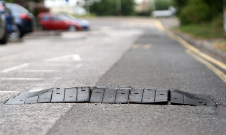 One of the crumbling speed bumps in Grange Terrace.