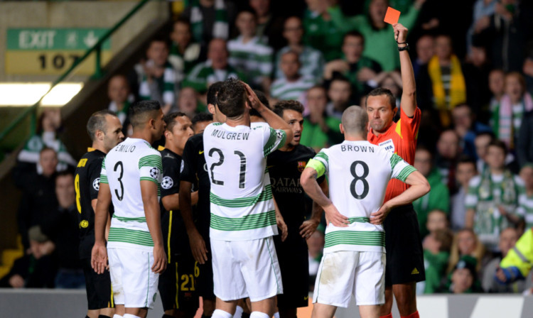Scott Brown was  shown a straight red card after his coming together with Neymar.