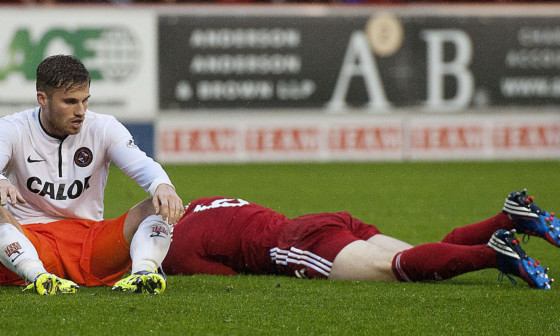 David Goodwillie cuts a dejected figure after his miss.