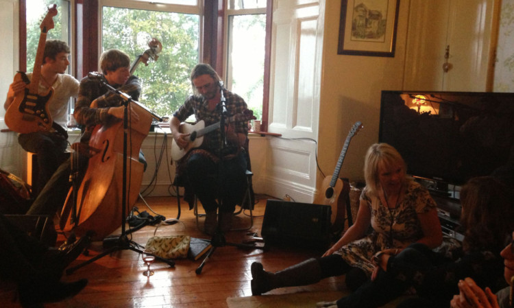 Members of Sienna with David Webster in a house gig hosted by Allyson James.