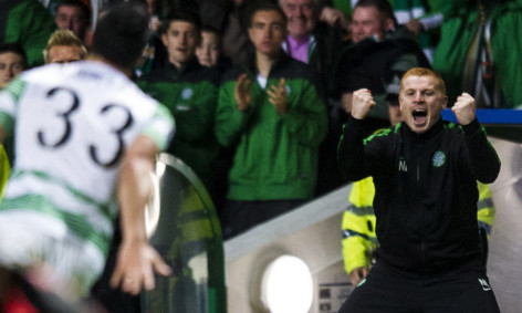 Neil Lennon celebrates after Beram Kayal scores to make it 2-0.