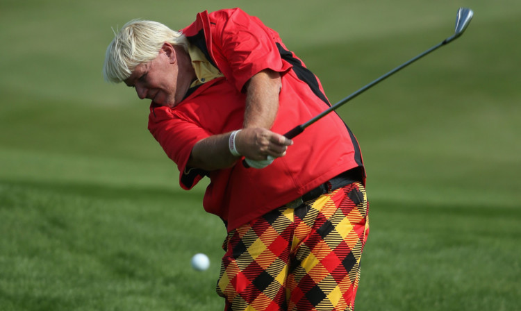 John Daly plays his second shot on the 18th hole in Shanghai.