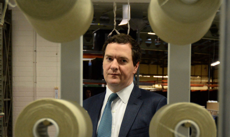 George Osborne during a visit to a Leeds textile manufacturer.