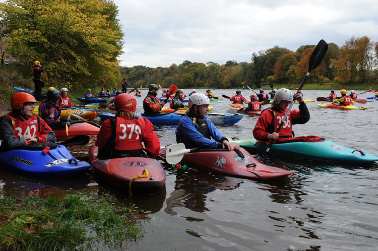 Almost 400 canoeists took to the water for the fourth annual Tay Descent on October 26. Setting out on a 23-mile jaunt from Dunkeld Cathedral, or the shorter route from Stanley Mills, participants aged 12 to 70 enjoyed what has become Scotlands largest on-water gathering. Some raced down the river  in surprisingly favourable weather  towards Perth, while others simply enjoyed the river, Perthshires autumn colours and some camaraderie. The outing is the highlight of the Paddle event, which later saw around 2,000 people visit the Bells Sports Centre for a packed weekend of talks and demonstrations.