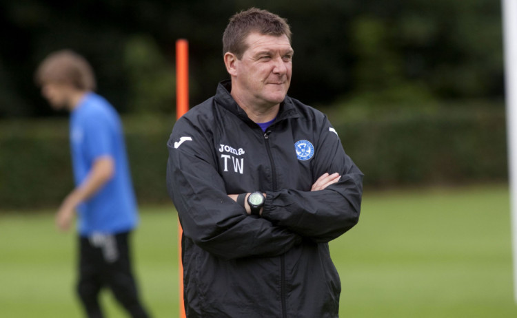 St Johnstone manager Tommy Wright casts an eye over training.