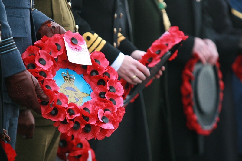 Kris Miller, Courier, News, 14/11/10. Rememberance Sunday, Dundee. Pic shows forces personel holding poppies at wreath laying on law.