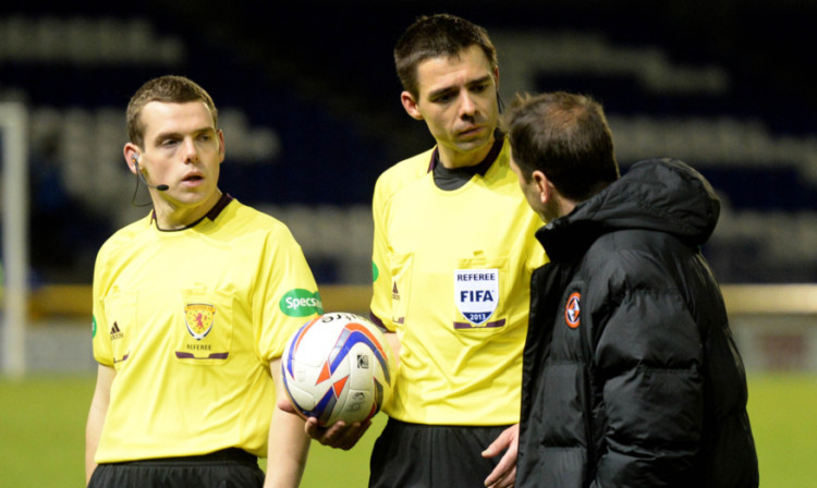 Jackie McNamara (right) approaches referee Kevin Clancy (centre) at full-time.