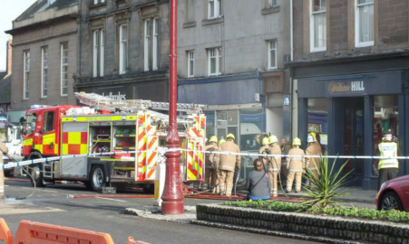 Firefighters tackling the blaze.