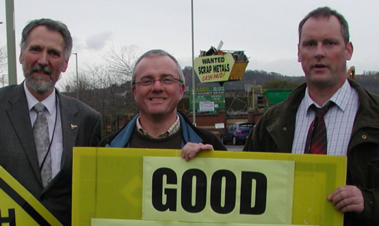 Councillor Lewis Simpson, Councillor Peter Barrett and campaigner Victor Clements celebrate news of the plan's defeat.