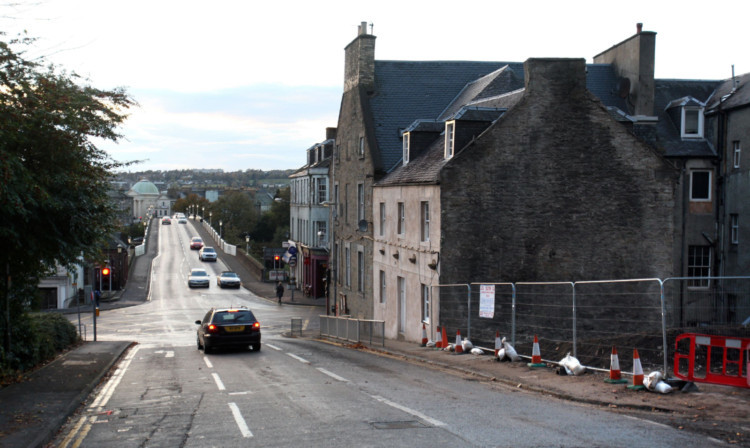 The junction of East Bridge Street and Main Street in Bridgend, Perth, which has reopened after the demolition of a block of flats.