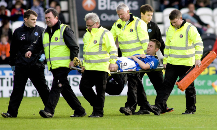 Steven MacLean was stretchered off after picking up a knee injury.