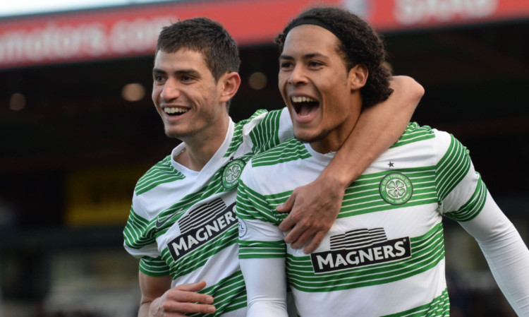 Van Dijk (right) is congratulated by Nir Biton.