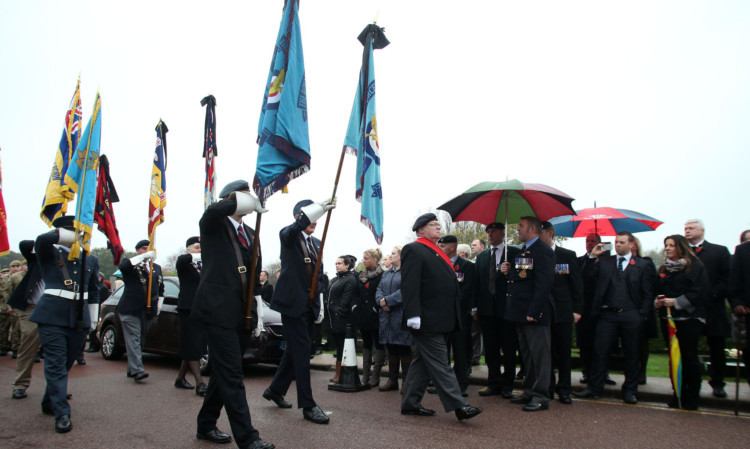 The public, veterans and service personnel gathered to pay their respects to Mr Percival.