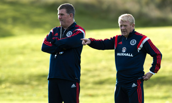 Mark McGhee and Gordon Strachan watching the Scotland squad in training.
