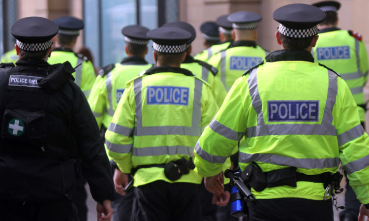 Kris Miller, Courier, 05/10/13. SDL and EDL protest in Dundee with Unite Against Fascism also protesting in opposition. Pic shows some of the large police presence that was brought in to keep control.