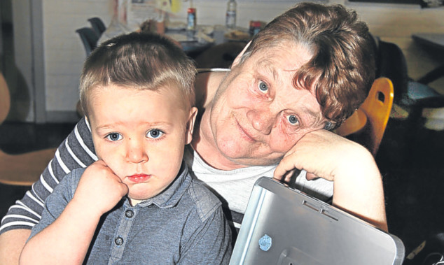 Margaret with one of her young playgroup tots.