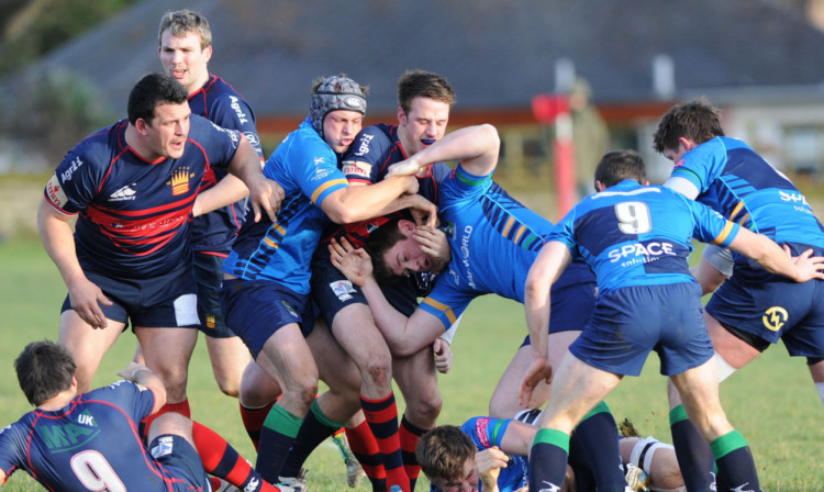 Action from Dundee HSFPs win over Boroughmuir at Mayfield.